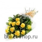 Солнечный луч. Розы, Зелень. Красивый букет из 15 сияющих желтых роз.